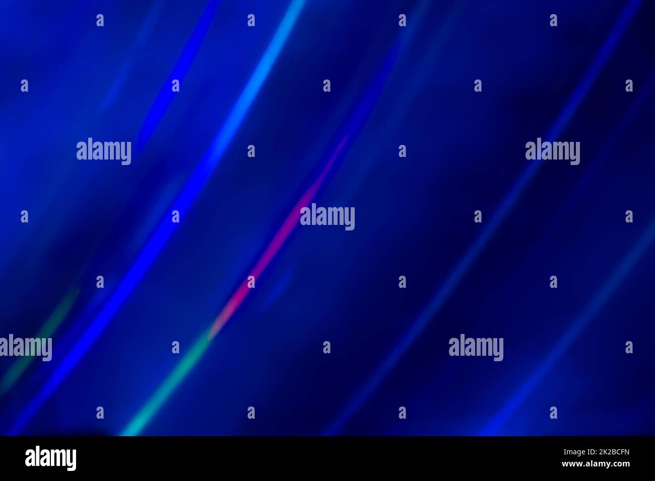 Blue rainbow abstract background from the sun shines on the silicon wafer. Stock Photo