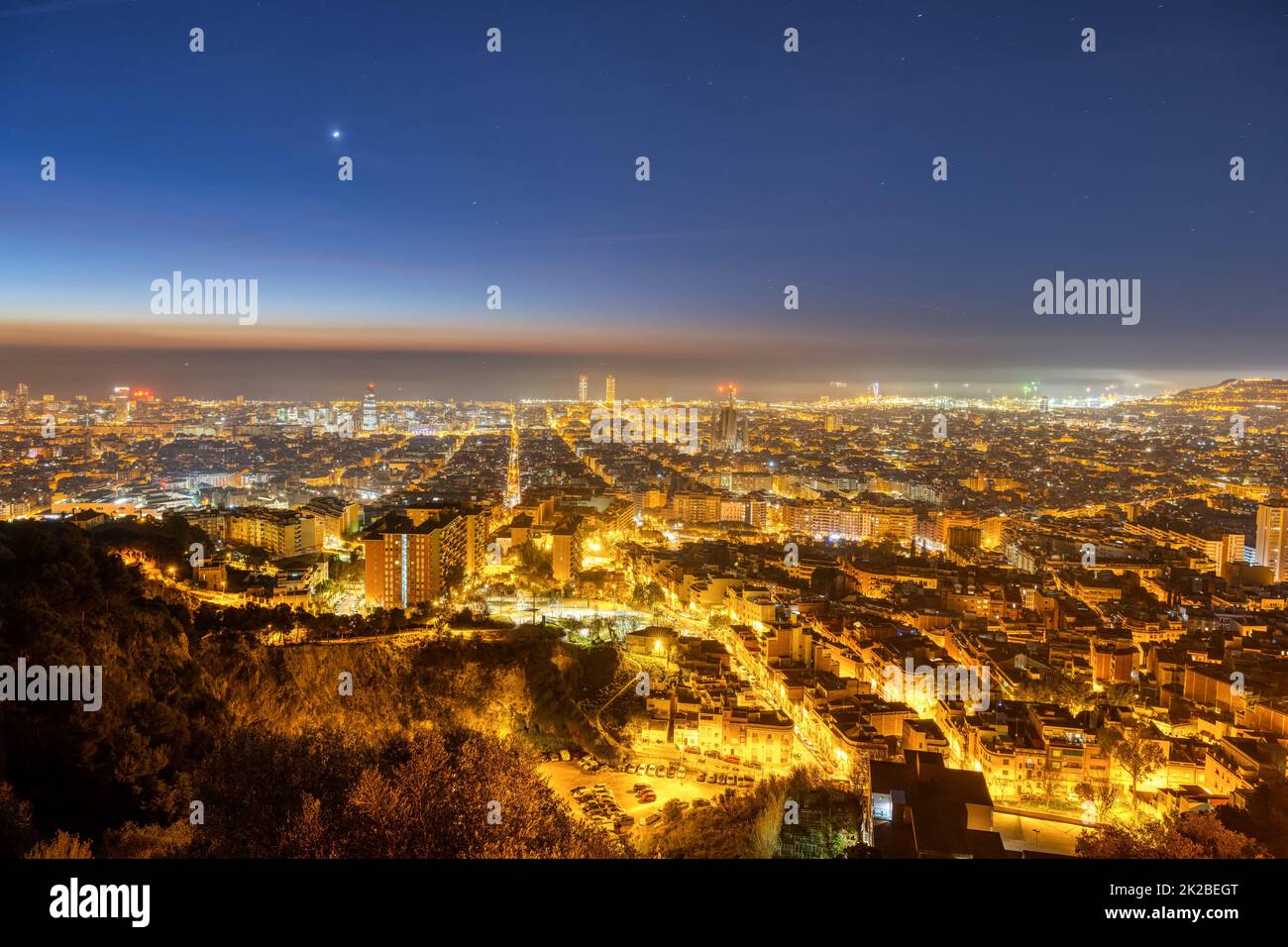 The skyline of Barcelona in Spain at night Stock Photo