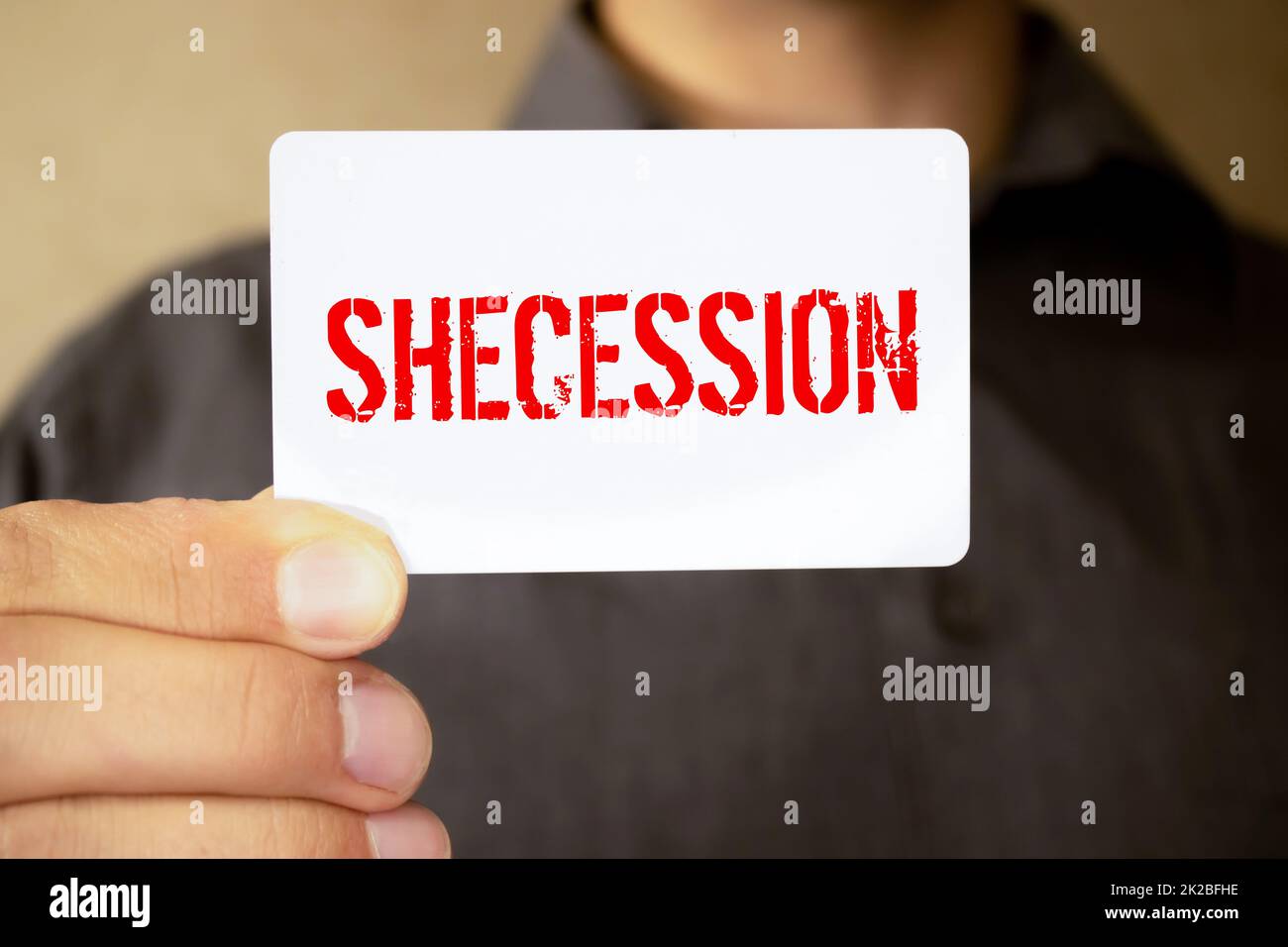 text on gray word secession in small wooden letters with black font on a blue background Stock Photo