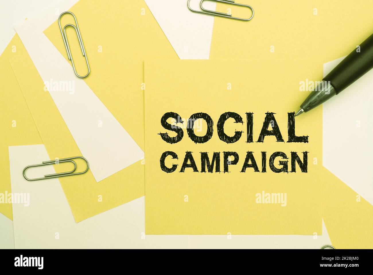 Writing displaying text Social Campaign. Concept meaning use social media platform to improve brand awareness Multiple Assorted Collection Office Stationery Photo Placed Over Table Stock Photo