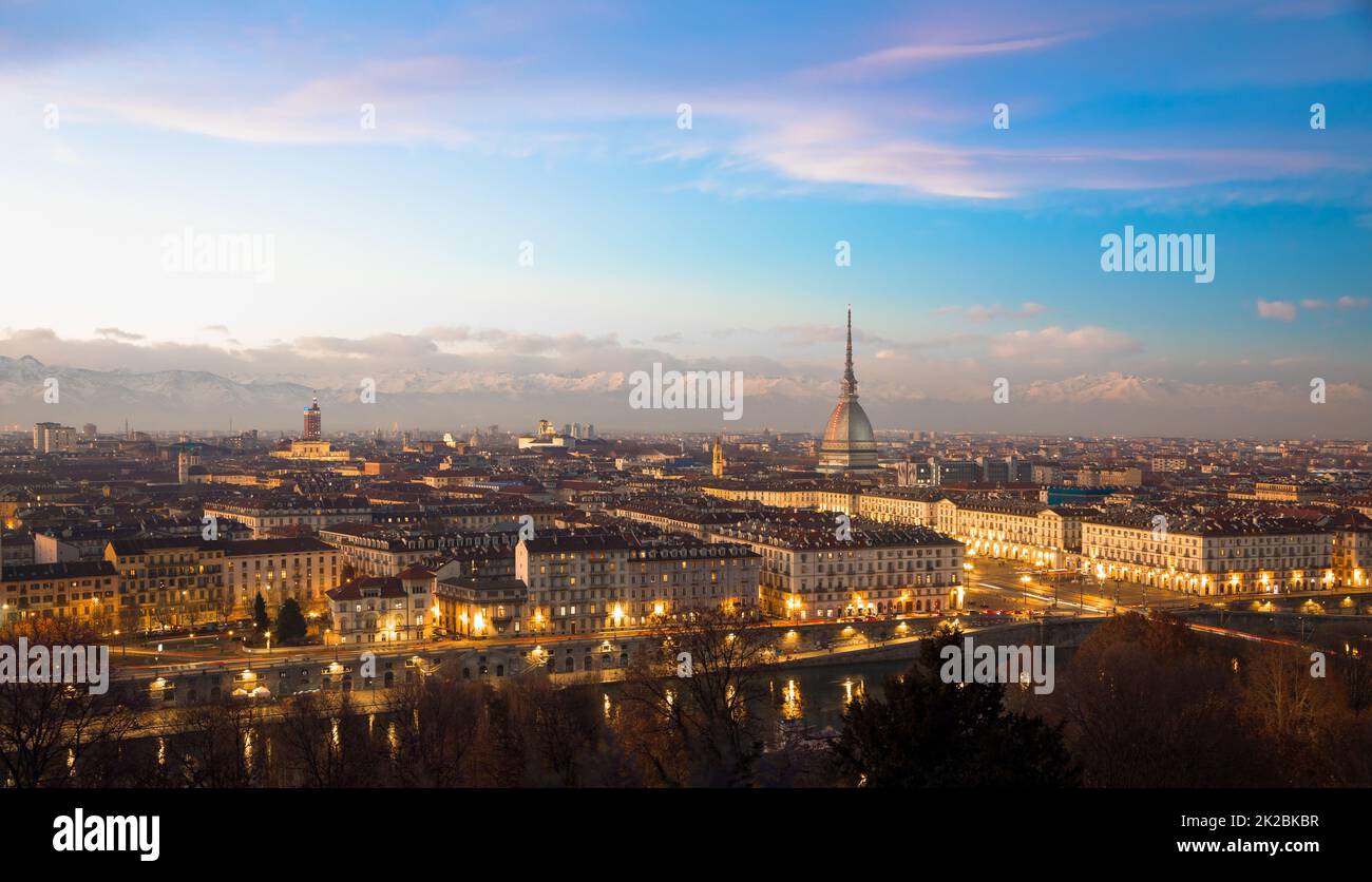 Turin, Italy. Panorama from Monte dei Cappuccini (Cappuccini's Hill) at sunset with Alps mountains and Mole Antonelliana Stock Photo