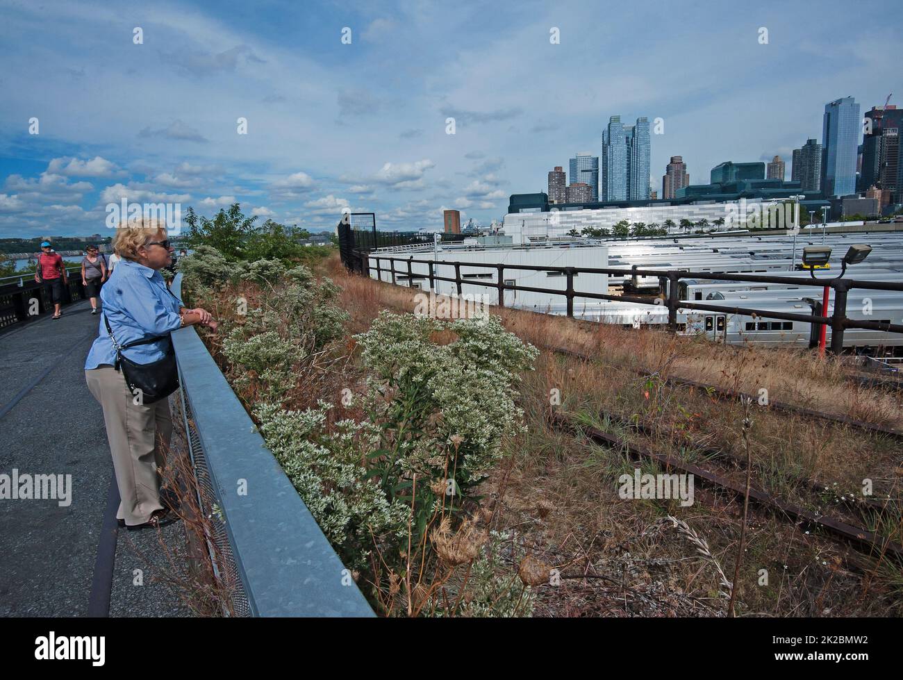 Tourist at High Line green space in Manhattan, New York City Stock Photo
