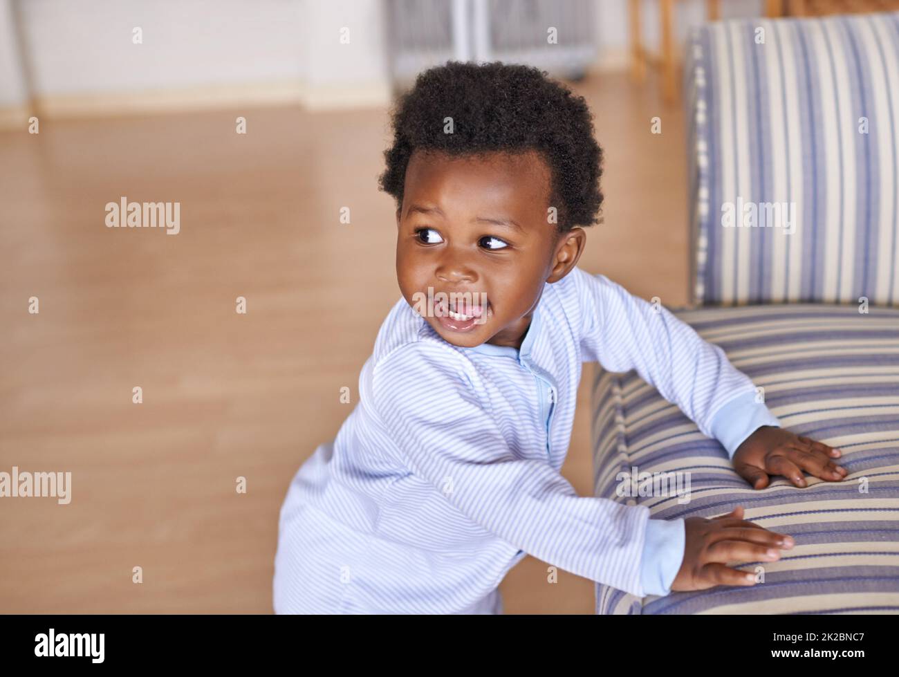 Baby at home. Shot of an adorable little baby boy at home. Stock Photo