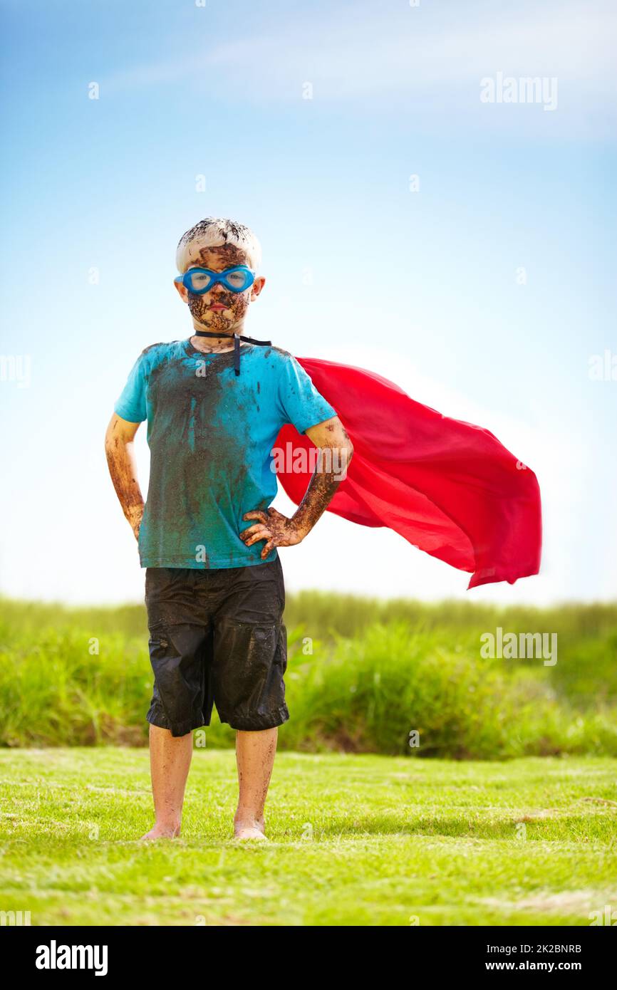 No dirt or mud will slow me down. Portrait of a muddy little boy