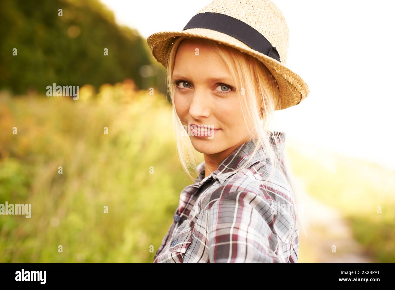 Wearing straw fedora hat hi-res stock photography and images - Alamy