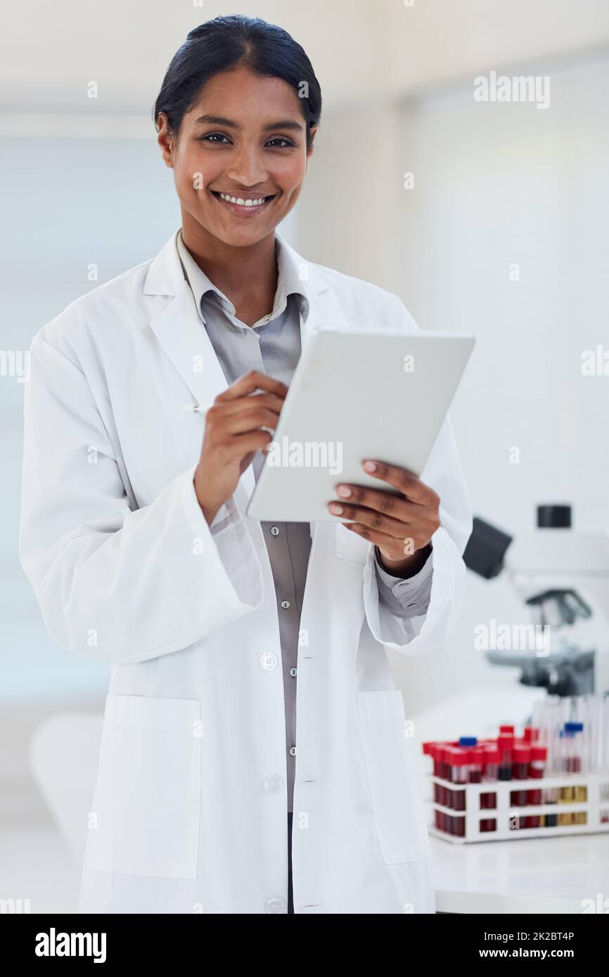 Shes considered as a leading expert in the scientific field. Portrait of a young female scientist working in a lab. Stock Photo