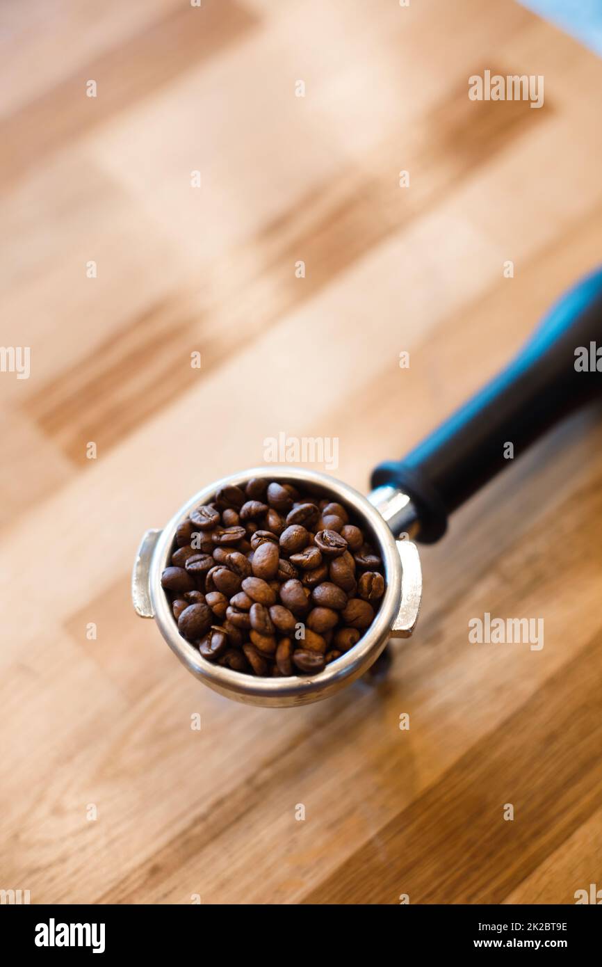 Fresh roasted coffee beans in an espresso filter Stock Photo Alamy