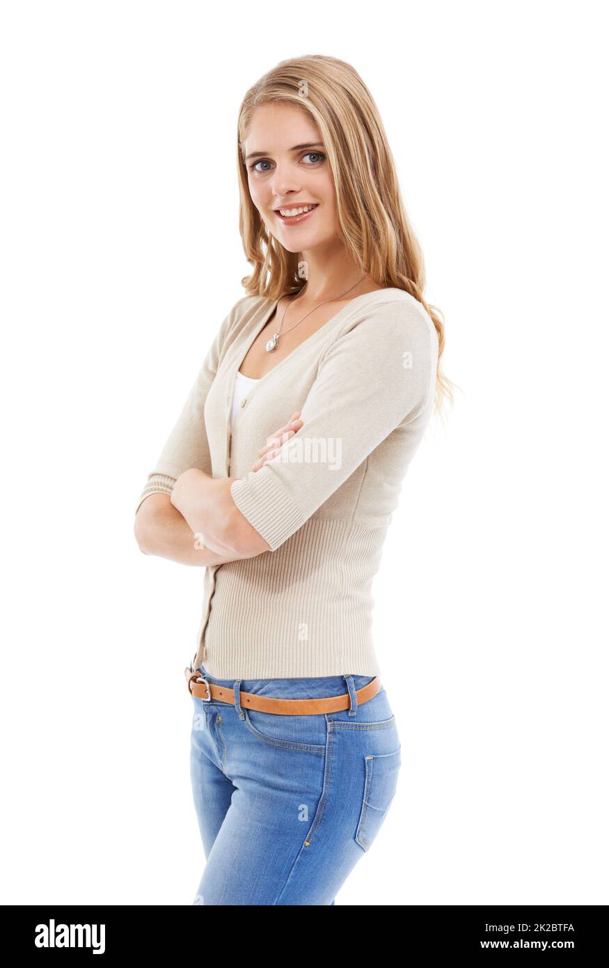 Casual confidence. Shot of an attractive young blonde woman isolated on white. Stock Photo