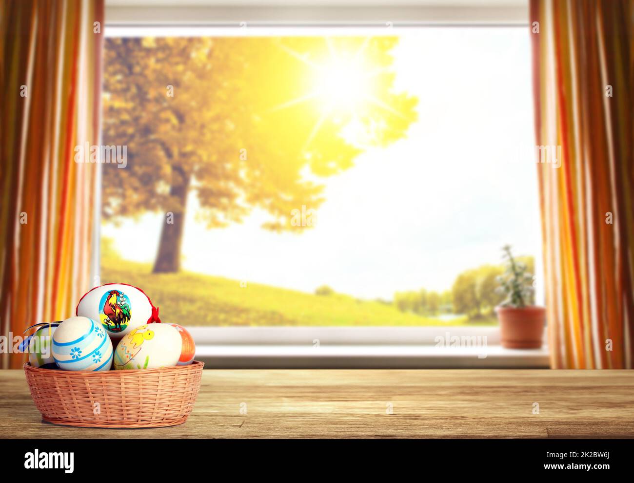 Easter background with colorful easter eggs on wooden background. Stock Photo