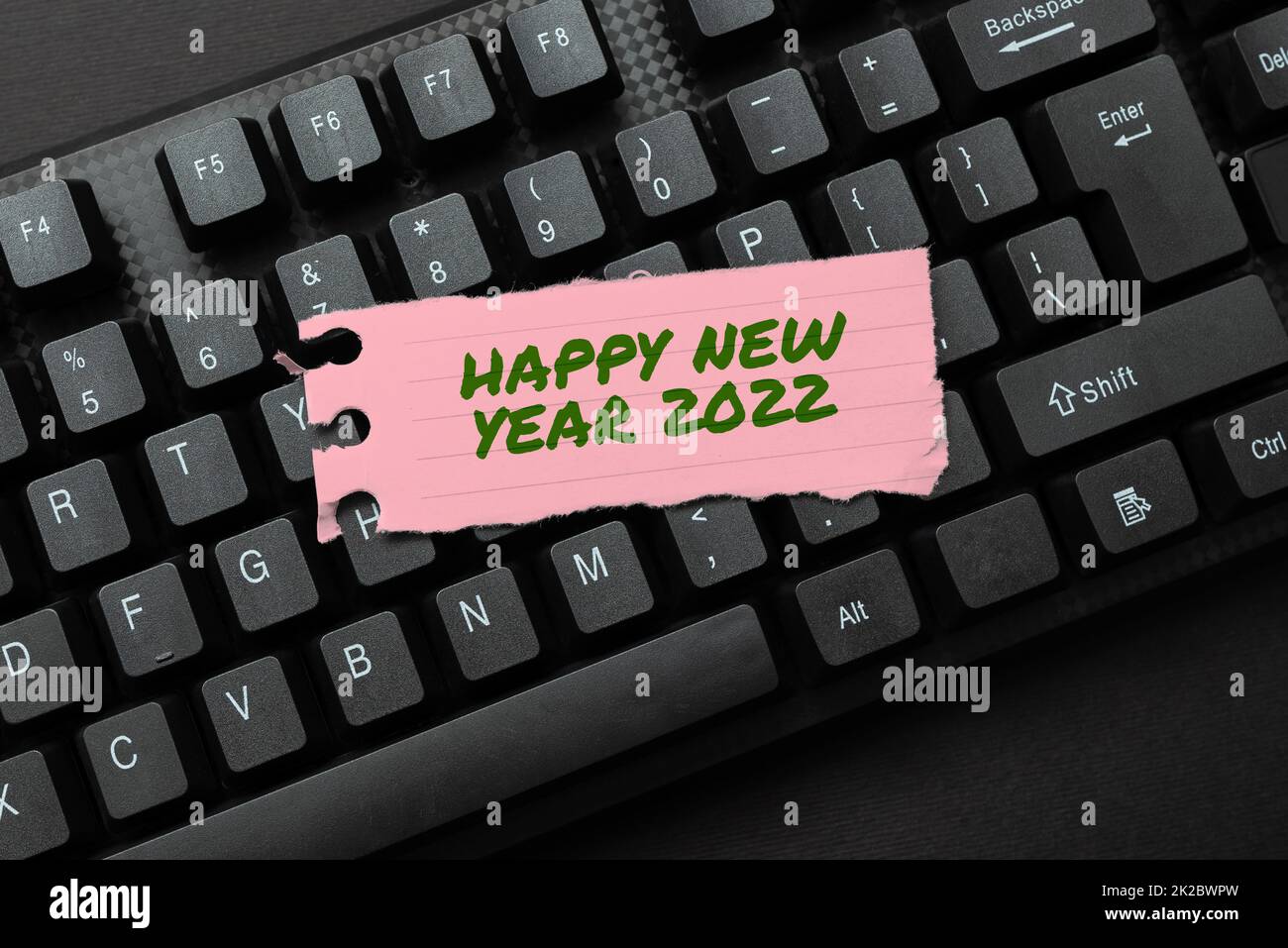 Conceptual display Happy New Year 2022. Business overview celebration of the beginning of the calendar year 2022 Editing And Retyping Report Spelling Errors, Typing Online Shop Inventory Stock Photo