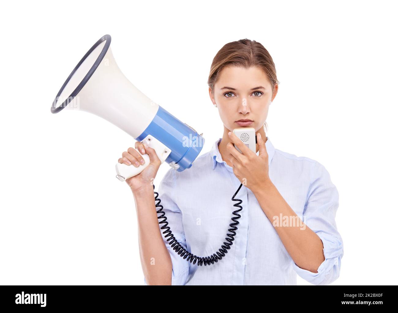 Shes got something to say. Portrait of an attractive young woman holding a megaphone. Stock Photo
