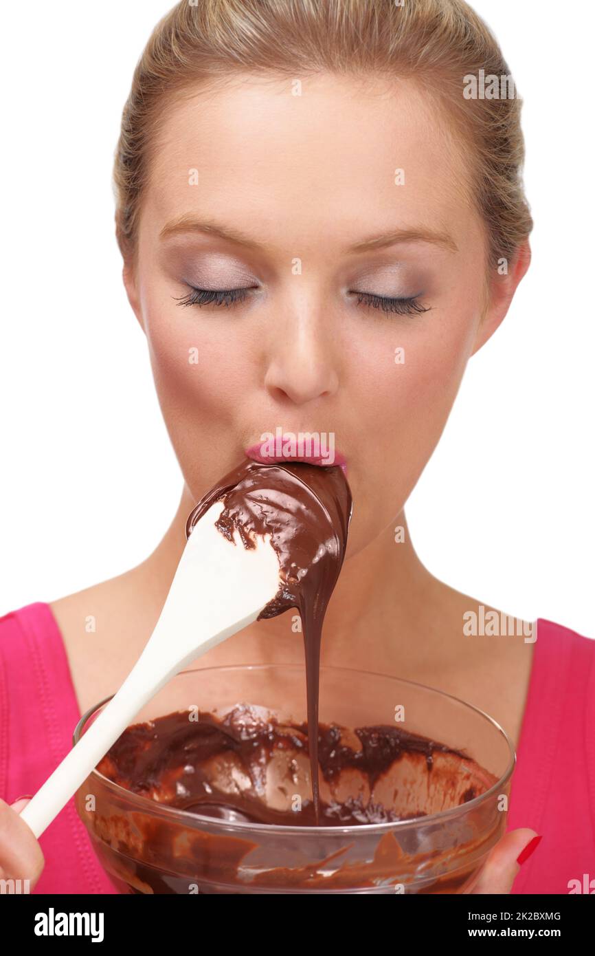 Delighting in lifes delicacies. A young blonde woman enjoying a bowl of