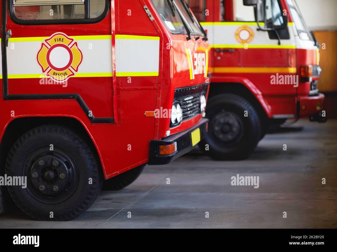 Ready for action. Cropped shot of parked fire engines. Stock Photo