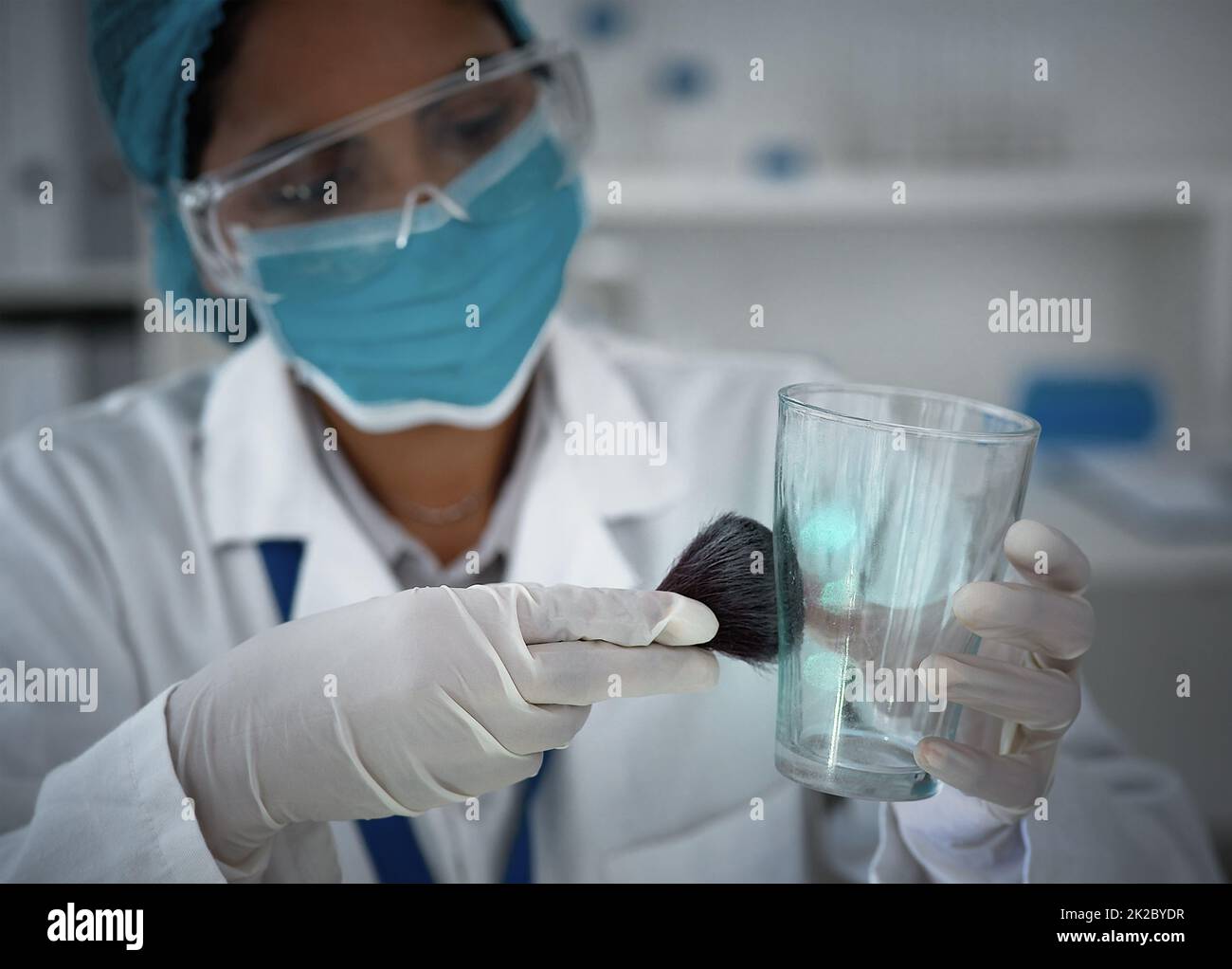 Now who do these belong to. High angle shot of a female forensic