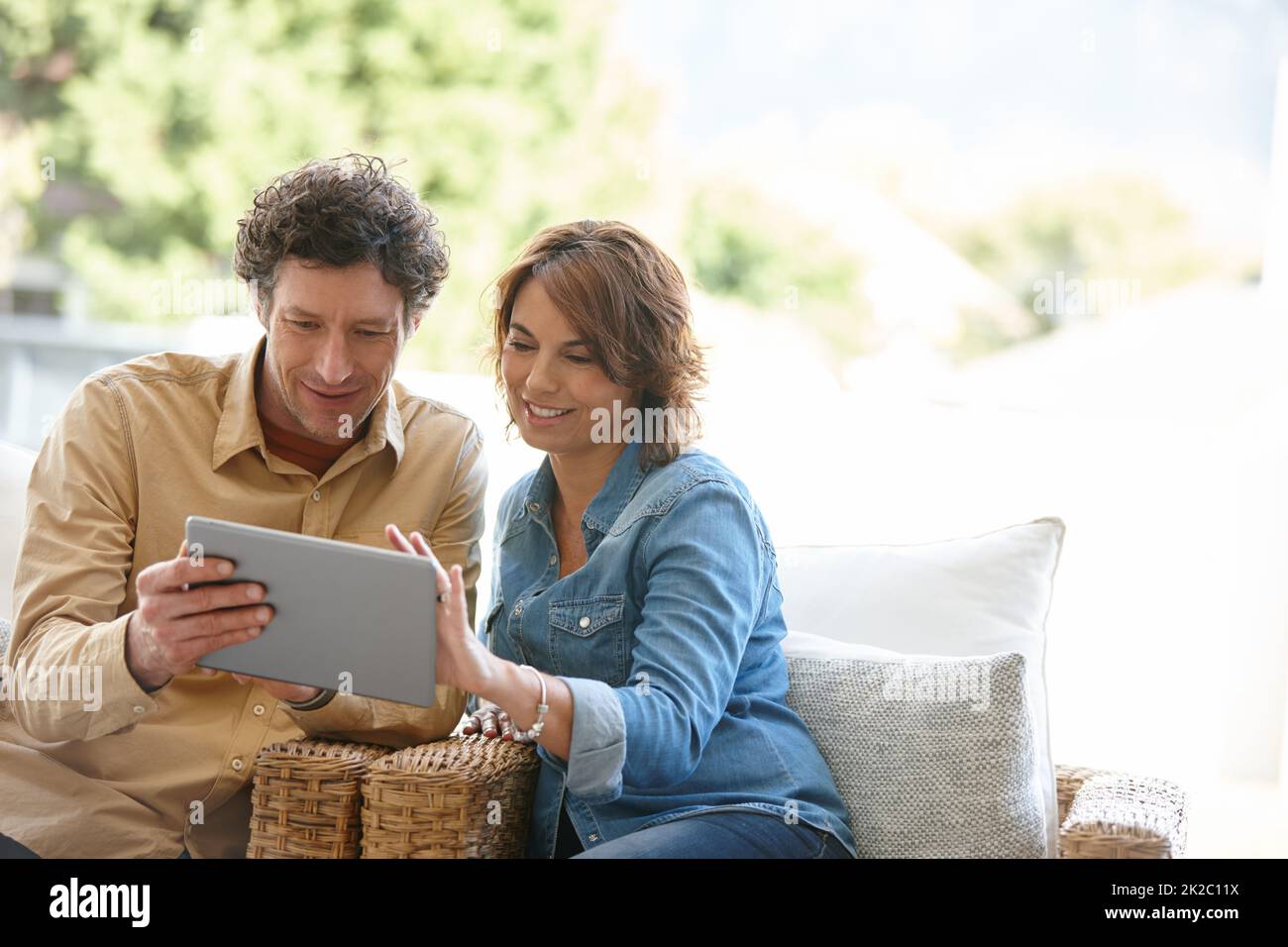 Logging into their joint email account shot of a husband and wife