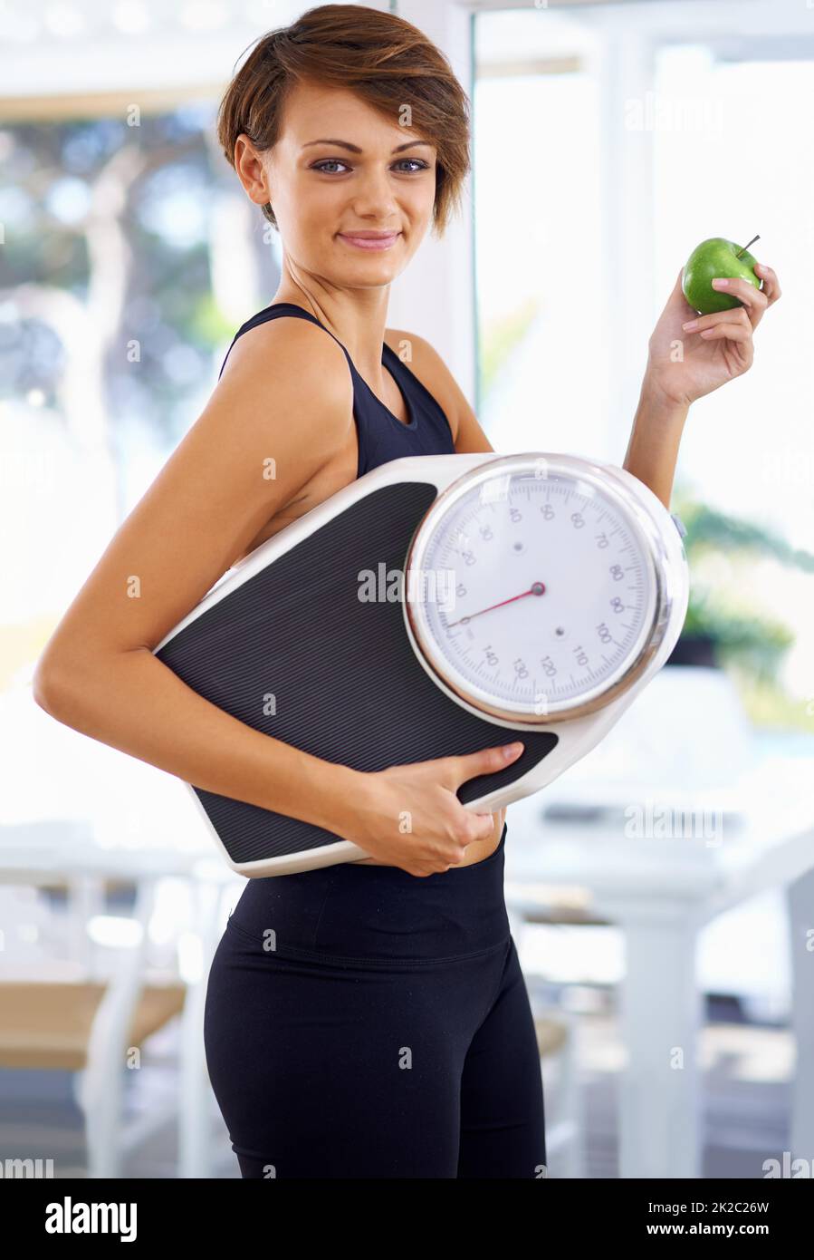 Weight loss scale celebrating hi-res stock photography and images - Alamy