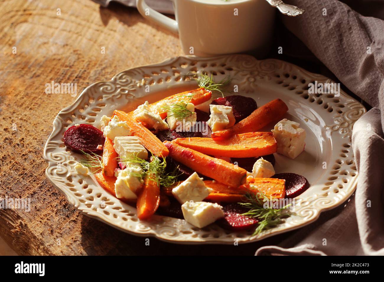 Healthy grilled beet carrots salad with cheese feta fennel and greek