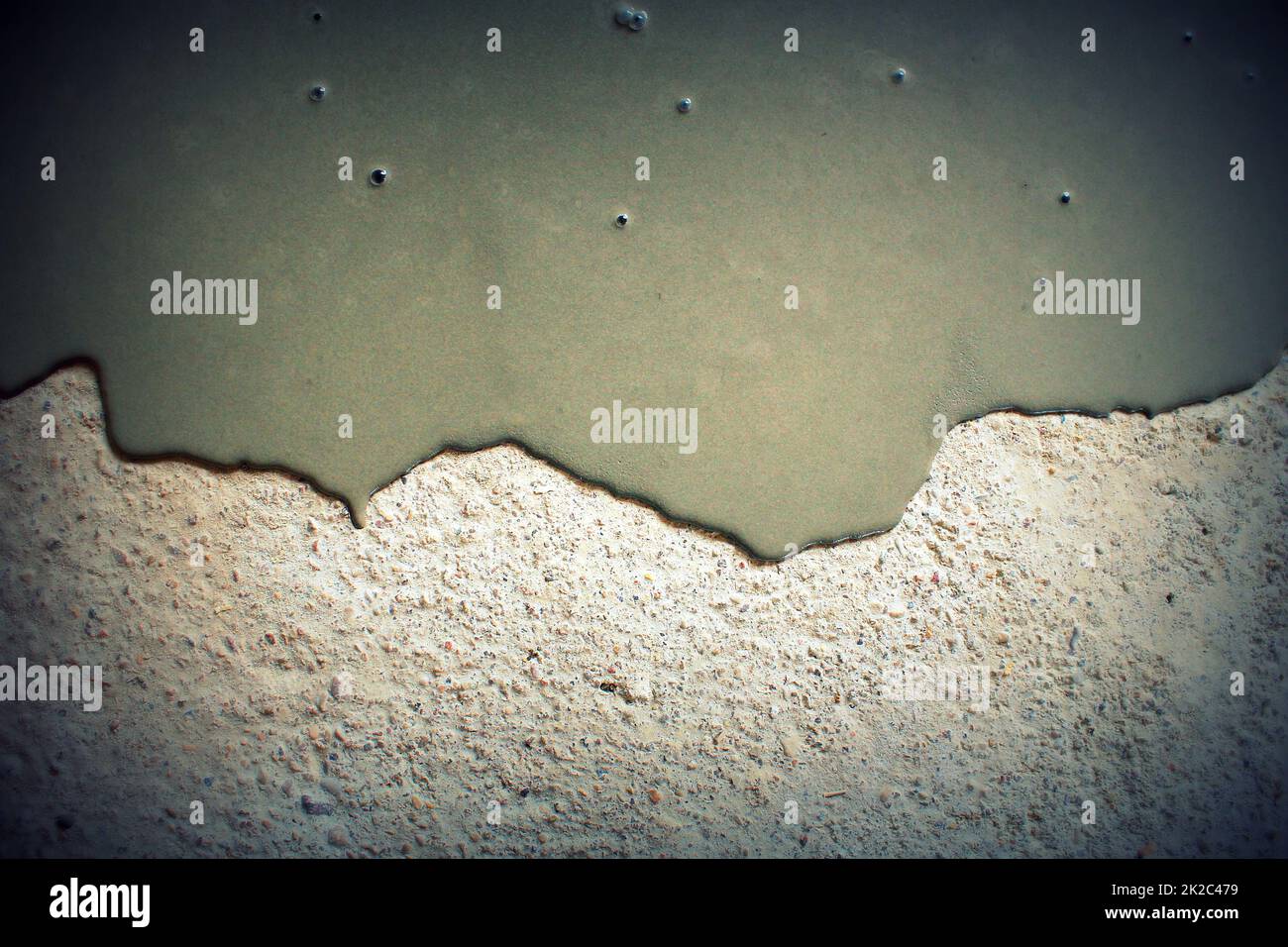 Concrete background. Self leveling compound spreading Stock Photo Alamy