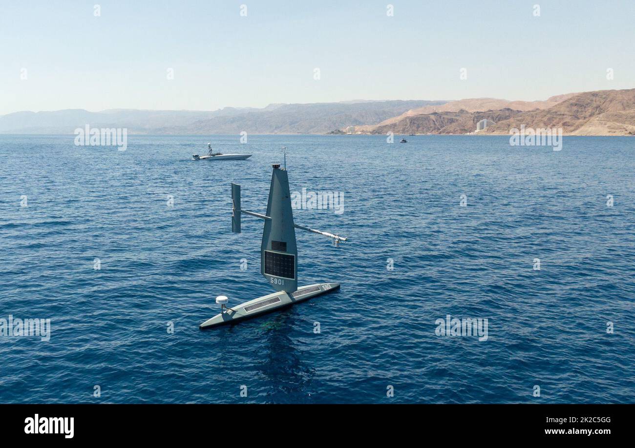 220921-N-NO146-1001 GULF OF AQABA (Sept. 21, 2022) Two unmanned surface vessels, a Saildrone Explorer and Devil Ray T-38 operate in the Gulf of Aqaba, during exercise Digital Shield, Sept. 21. Digital Shield is a bilateral training exercise between U.S. Naval Forces Central Command and Israeli naval forces that focuses on enhancing maritime awareness using unmanned systems and artificial intelligence in support of vessel boarding operations. (Courtesy Photo) Stock Photo