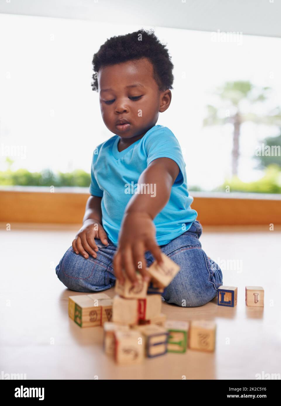 Baby with building blocks babies hi res stock photography and