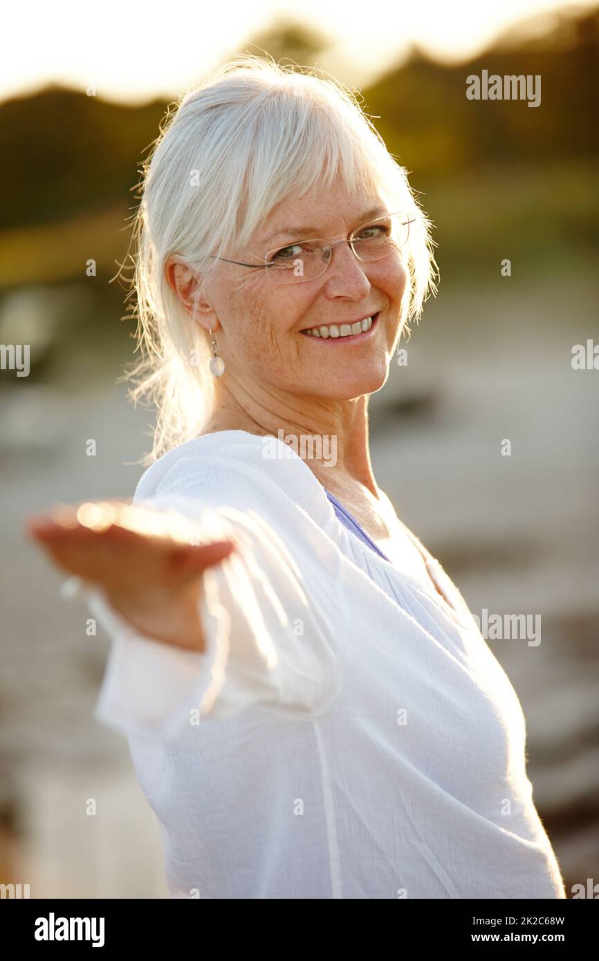 Mature woman beach joy hi-res stock photography and images - Alamy