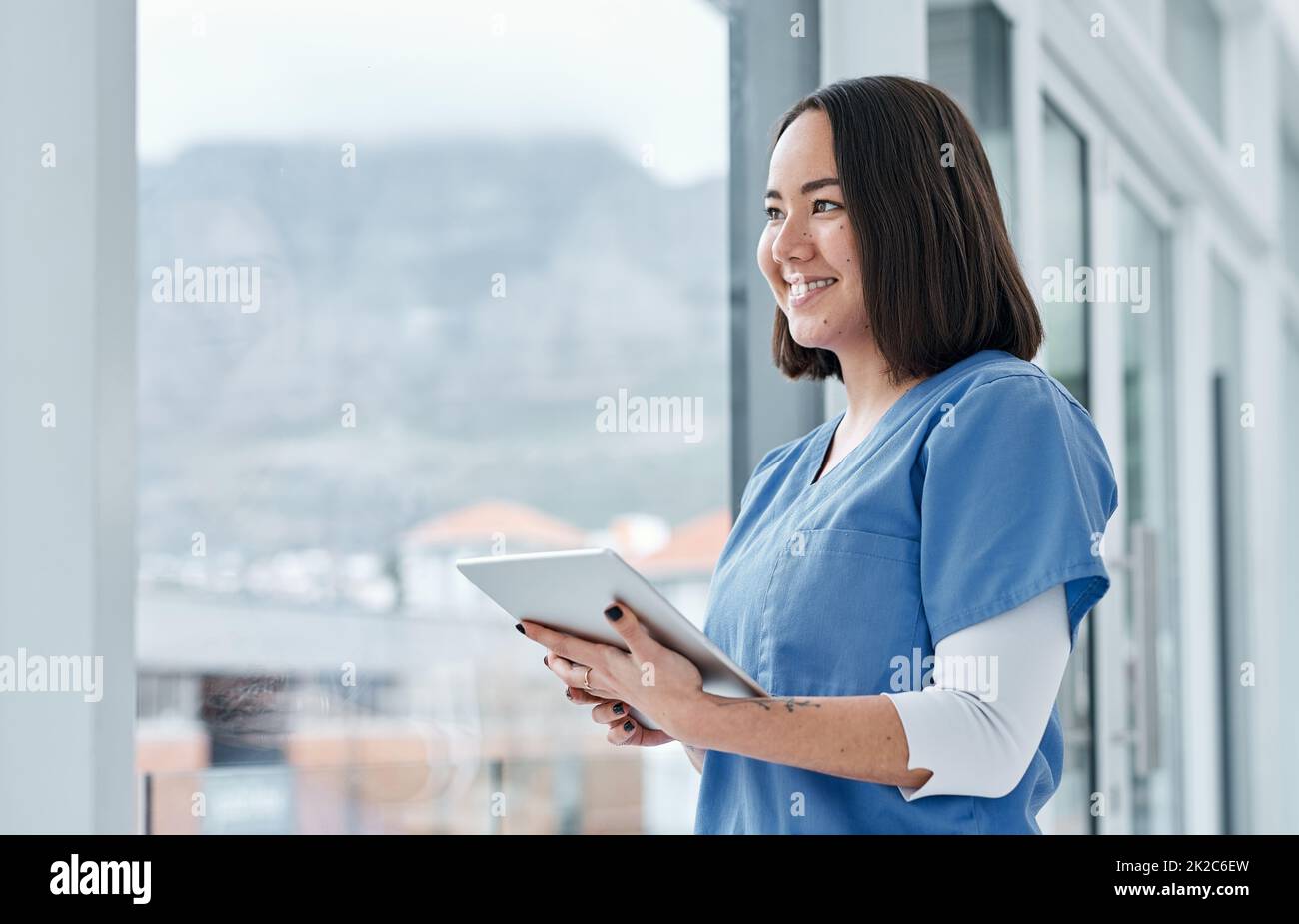 Facilitating effective data management with smart tech. Shot of a medical practitioner using a digital tablet in a hospital. Stock Photo
