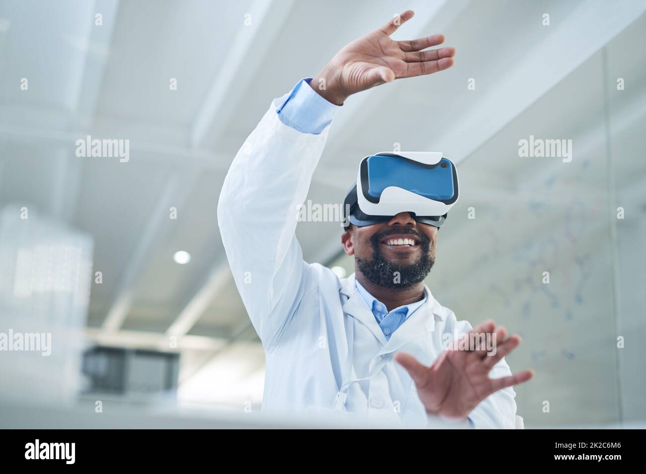 Shaping a whole new world through science. Shot of a mature scientist using a virtual reality headset while working in a lab. Stock Photo
