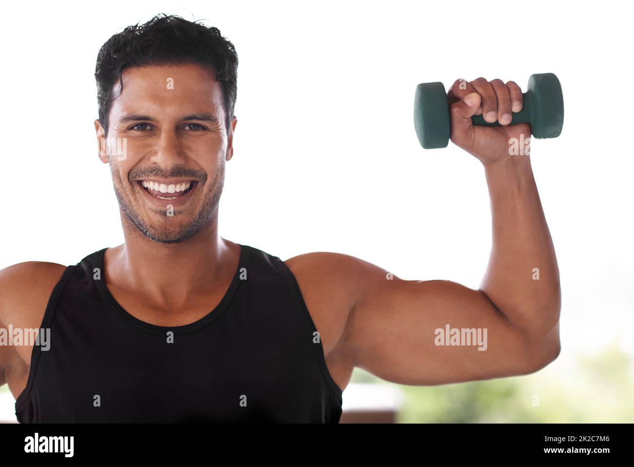 Man lifting weights standing hires stock photography and images Alamy