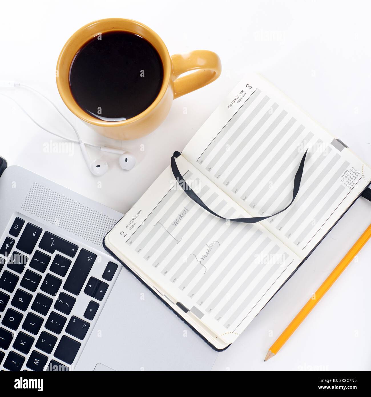 Well prepared for productivity. Shot of a laptop and coffee mug on a table. Stock Photo