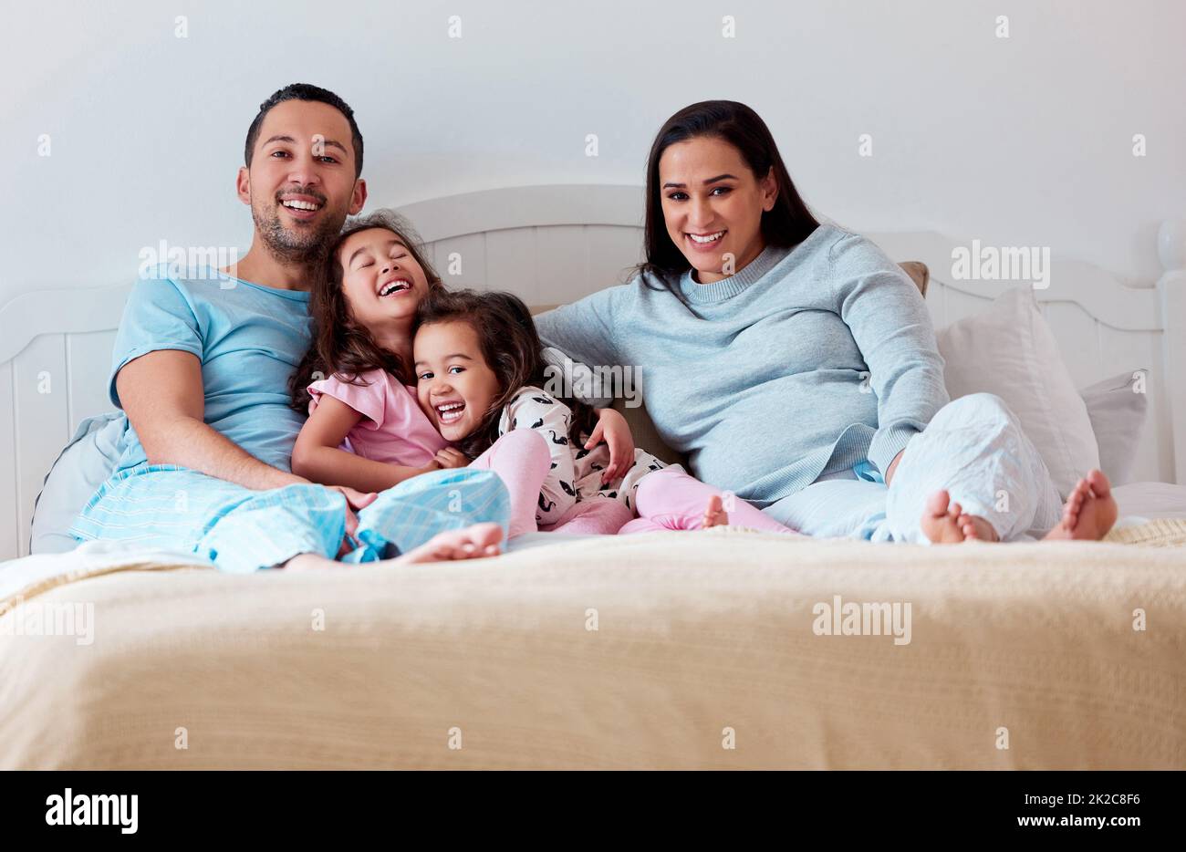 What makes a house a home is the family who lives in it. Shot of a couple lying on bed with