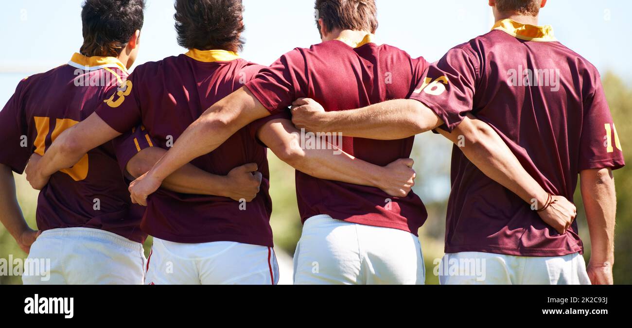 We came to win. Rearview shot of a young rugby team lining up for a scrum. Stock Photo