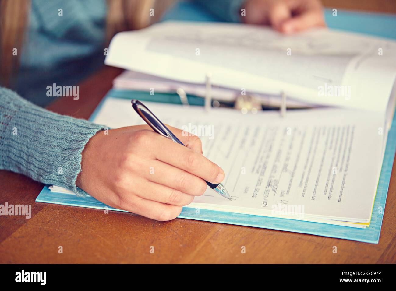 Continual assessment is crucial. Closeup shot of a teacher marking a test. Stock Photo
