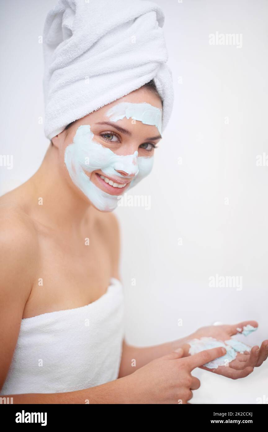 Getting rid of all impurities. A young woman wearing a facemask. Stock Photo