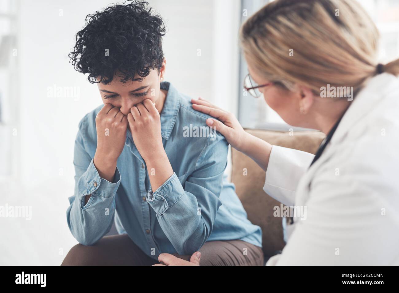 Everything will be fine if you just take your treatment.... Cropped shot of a compassionate young female doctor consoling a female patient in her office. Stock Photo