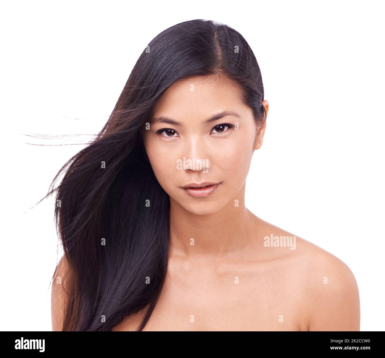 Oriental goddess. Cropped shot of a beautiful young oriental woman against a white background. Stock Photo