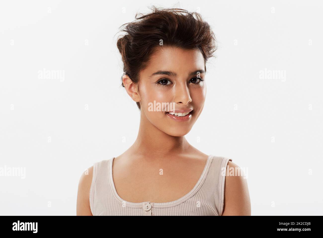 Active and loving it. A young woman in casual wear smiling at the camera. Stock Photo