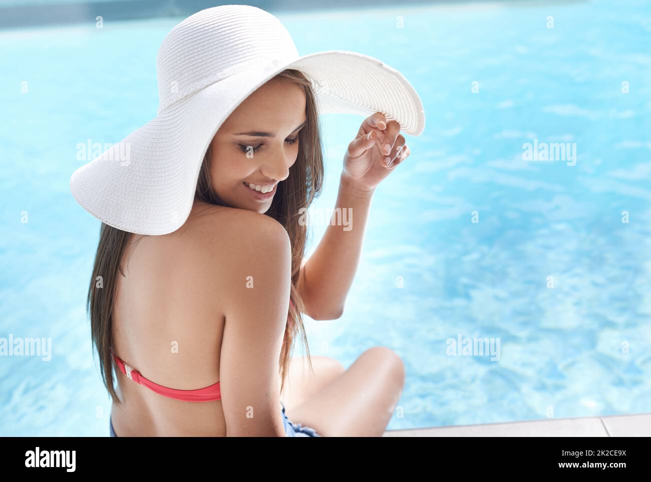 Wearing bikini wearing swimming costume hi-res stock photography and images  - Alamy