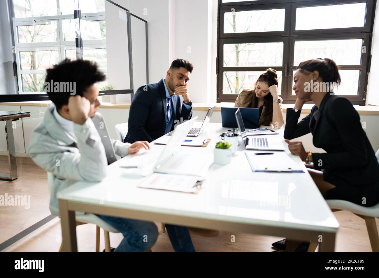 Diverse Bored Meeting Training Presentation Stock Photo