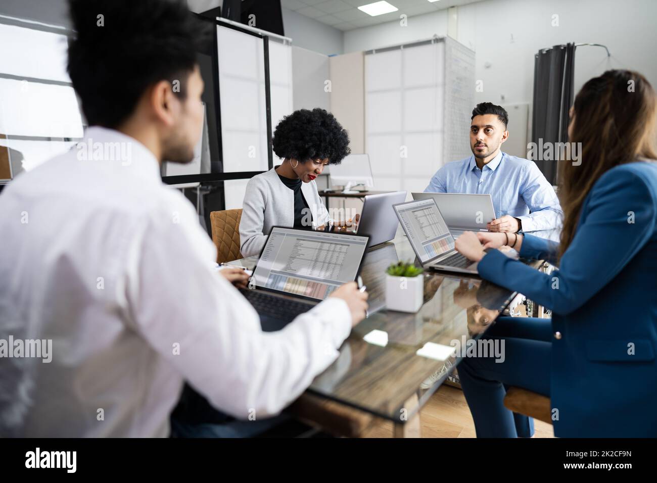 Diverse Business People Group At Workplace Stock Photo - Alamy