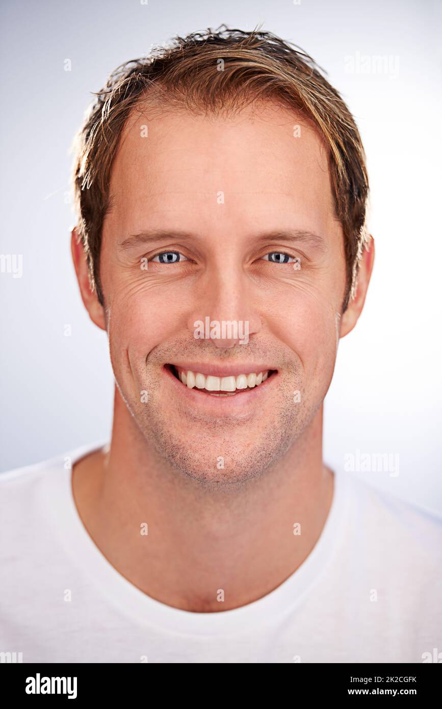 Smiling about skincare. Cropped studio shot of a smiling confident man. Stock Photo