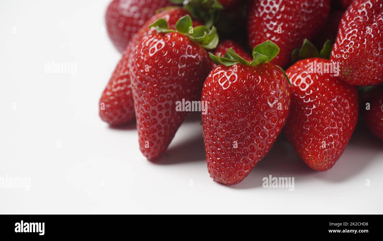 Strawberry fresh organic fruit. Strawberries with leaves on a white ...