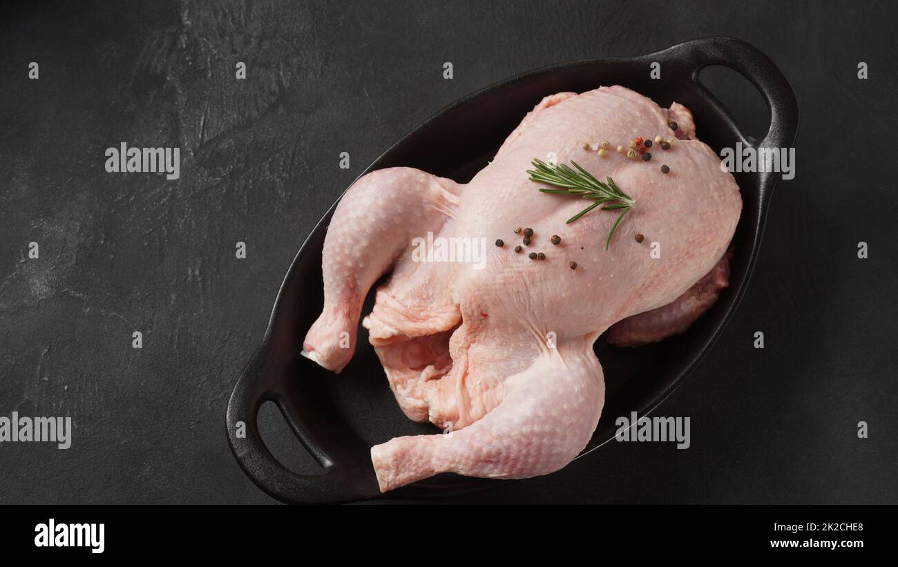 Fresh raw chicken on cutting board and spices for cooking Stock Photo by  ff-photo