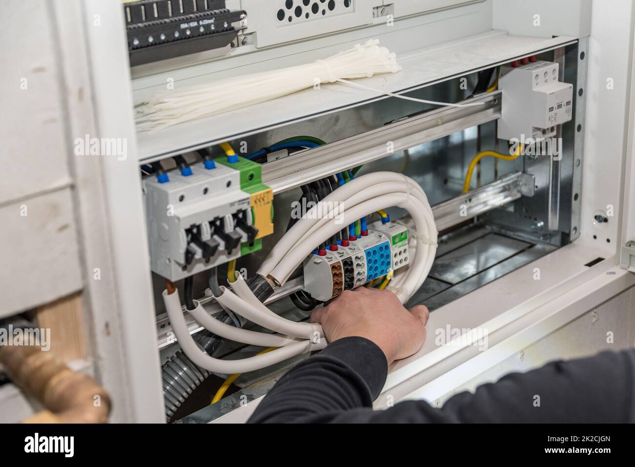 Electricians for electrical installations in the shell - craftsmen for building a house Stock Photo