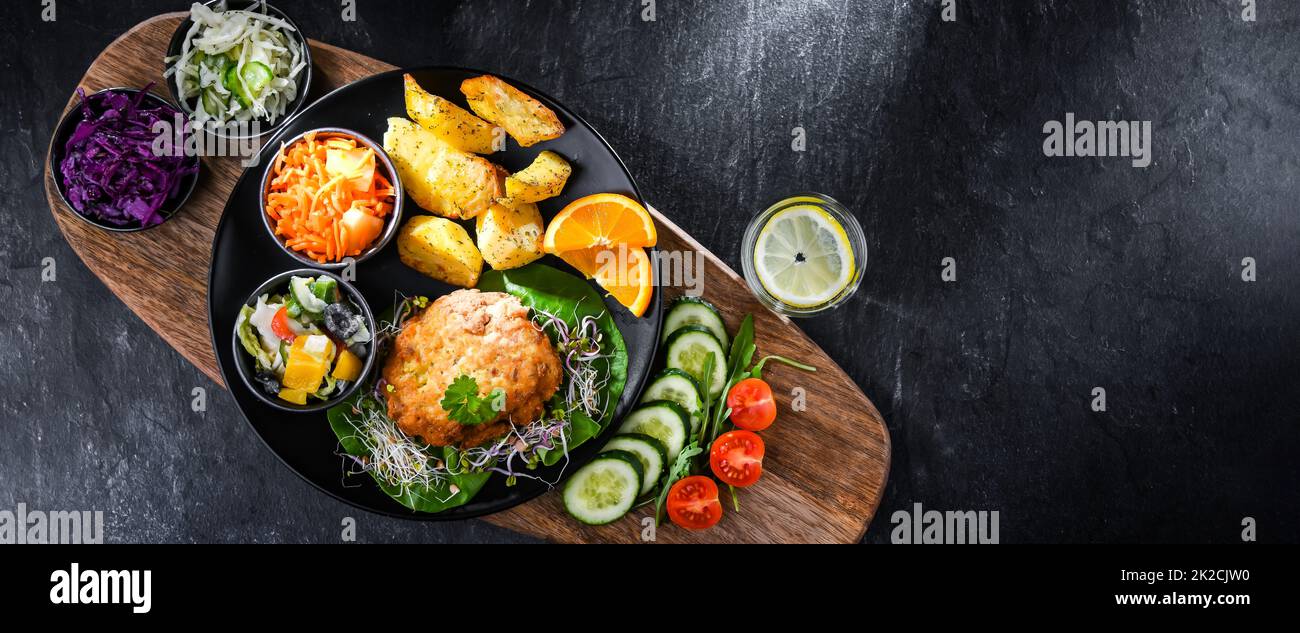 Pulled chicken cutlet coated with breadcrumbs Stock Photo