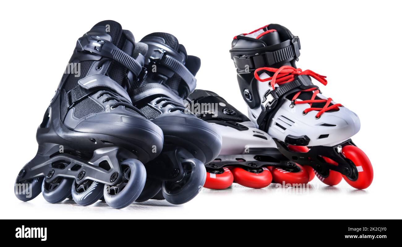 Two pairs of inline skates isolated on white background Stock Photo Alamy