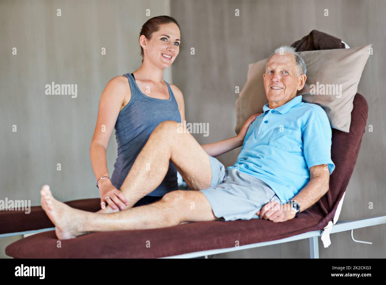 Hes on the mend. Shot of a a physical therapist working with a senior man. Stock Photo