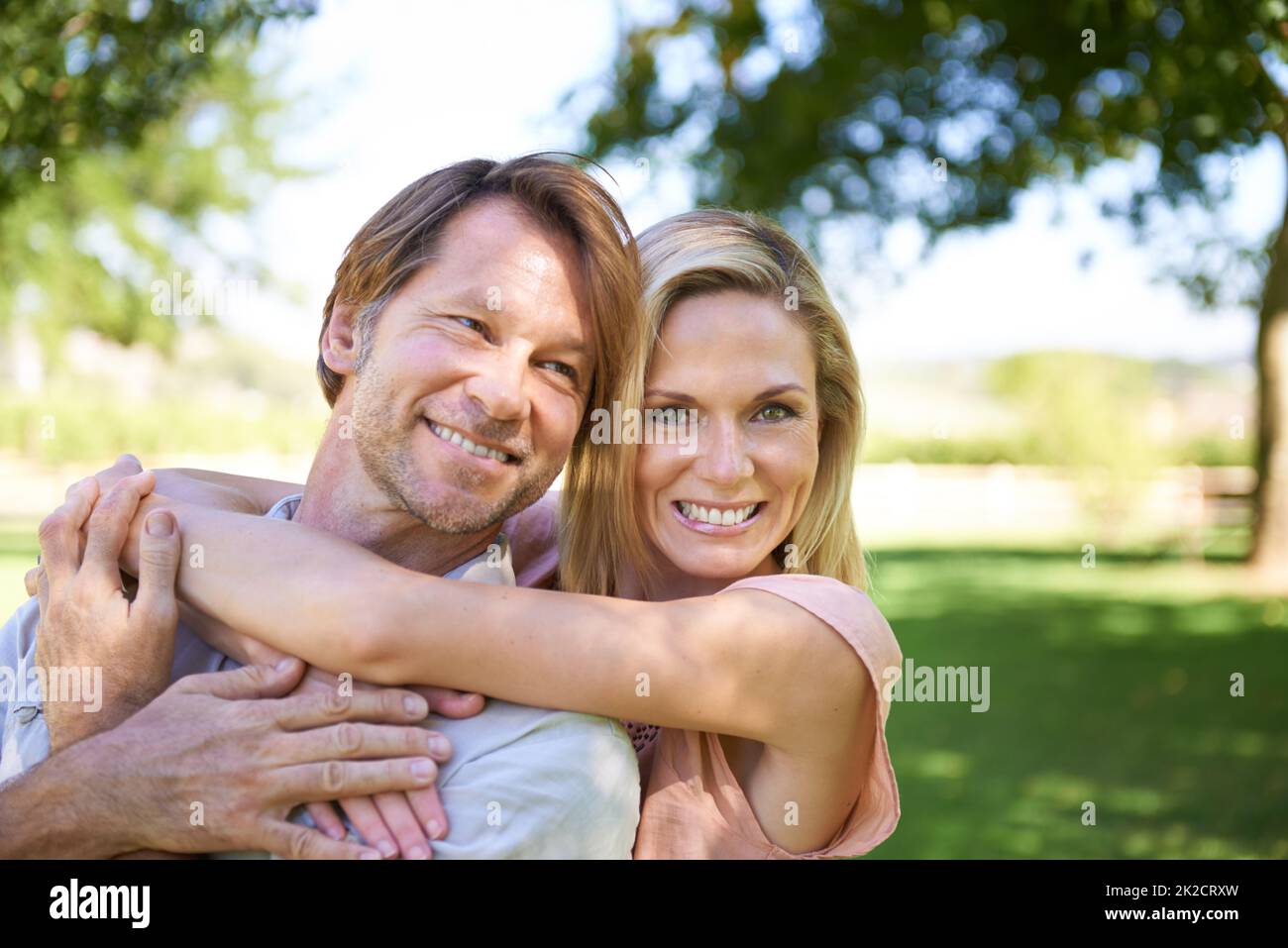 Hes my husband and best friend. Portrait of an affectionate mature couple enjoying a day in the park. Stock Photo