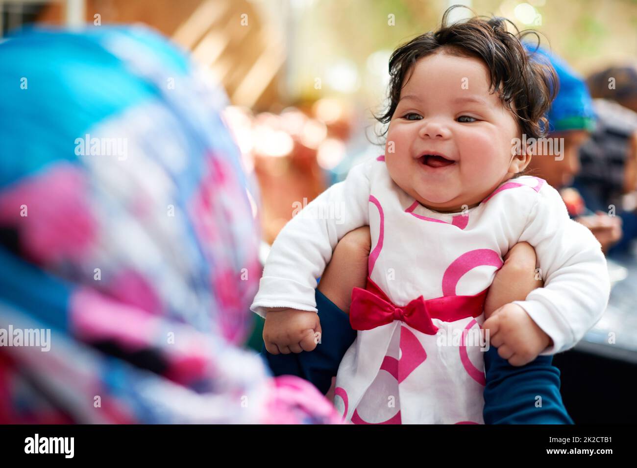 Whos my pretty girl. Shot of a muslim mother and her little baby girl. Stock Photo