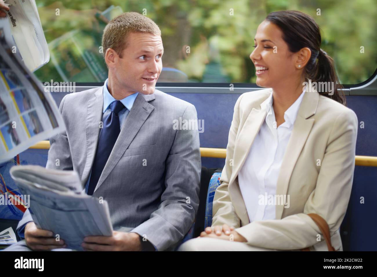 The daily commute. Shot of young business people commuting to work. Stock Photo