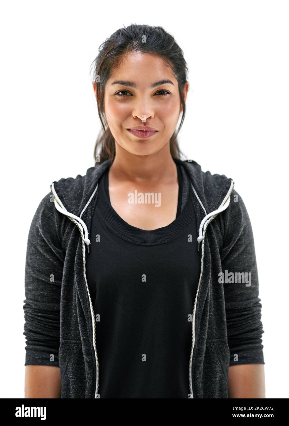 Staying in great shape with daily exercise. Portrait of a fit young woman in sports clothing posing against a white background. Stock Photo